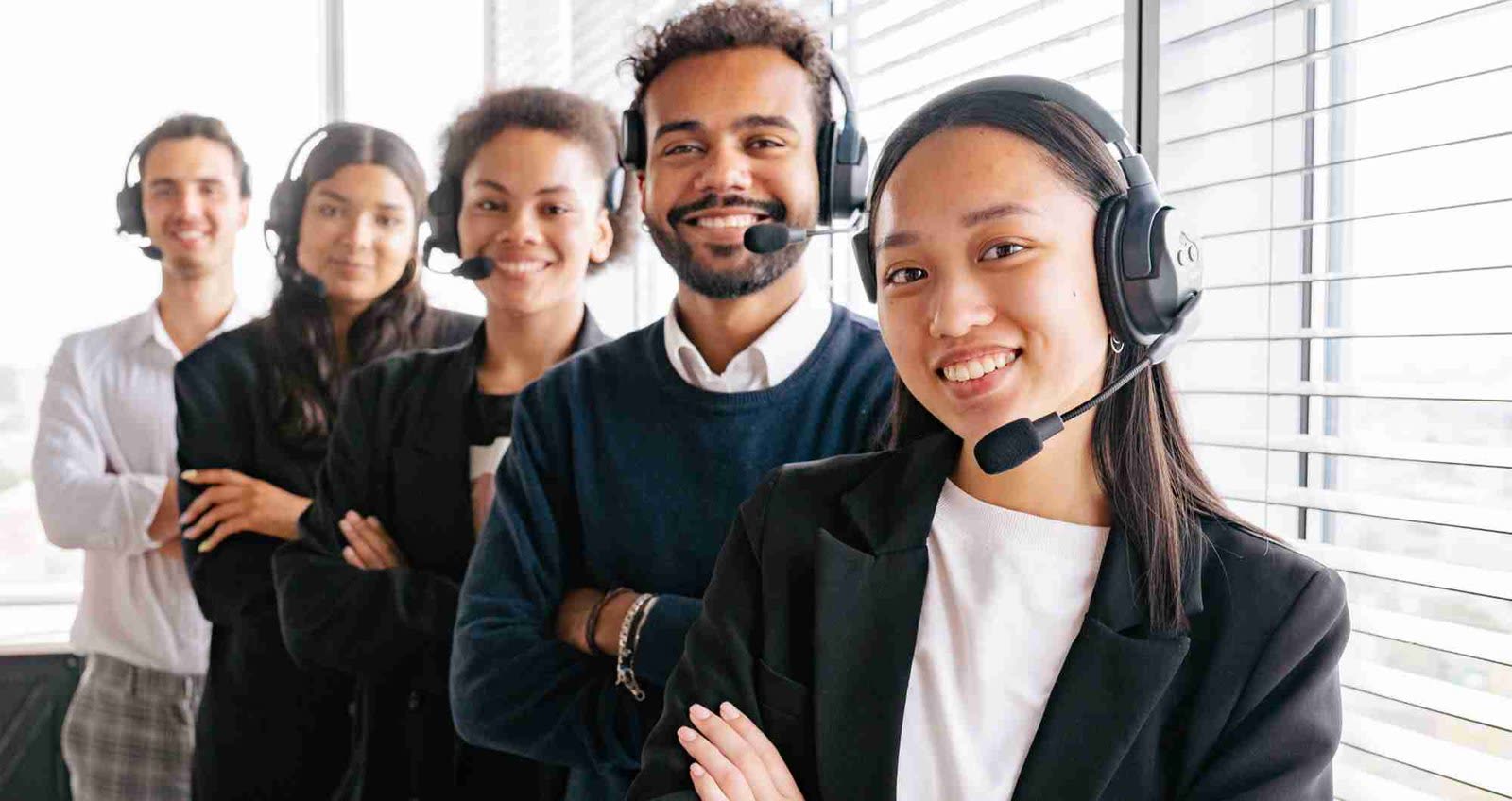 Customer service operator with headset providing technical support